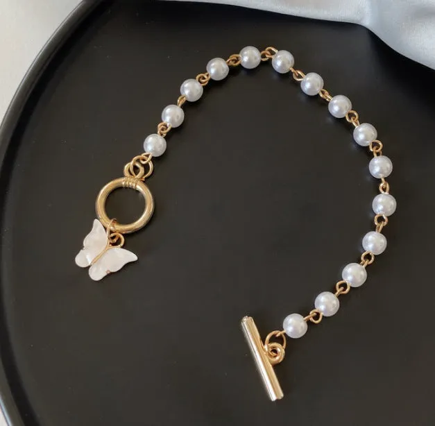 Feminine Pearl Charm Bracelet with Super Fairy Butterfly Pendant