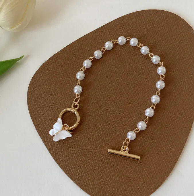 Feminine Pearl Charm Bracelet with Super Fairy Butterfly Pendant